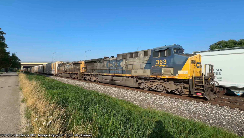 CSX 363 leads M276 through the scene.